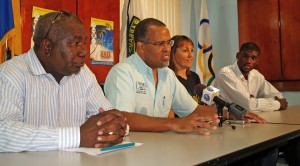 Squash Talk: (From left) Monty Cumberbatch, tournament director of the 22nd Senior Caribbean Squash Championships; Criag Archer, president of the Barbados Squash Association; local squash queen Karen Meakins; and reigning national champion, Shawn Simpson. 