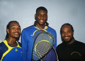 Keeping local hopes alive!: Men’s captain Shawn Simpson(centre), along with Cumberbatch brothers Rhett (left) and Gavin, have secured places in the third round of the 22nd Senior Caribbean Squash Championships.